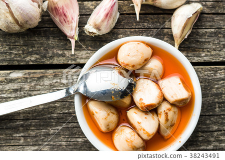 Tasty preserved garlic. Tasty preserved garlic. 38243491