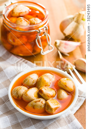 Tasty preserved garlic. Tasty preserved garlic. 38243495