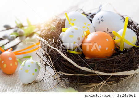 Easter eggs decoration, eggs in the nest Easter eggs decoration, eggs in the nest 38245661
