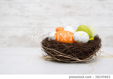 Happy easter decoration. Eggs in the nest. Happy easter decoration. Eggs in the nest. 38245663