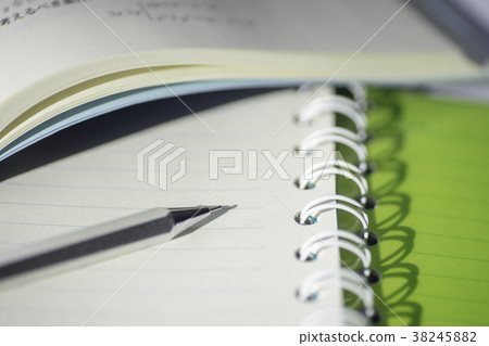 Notebook and pen and book Notebook and pen and book 38245882