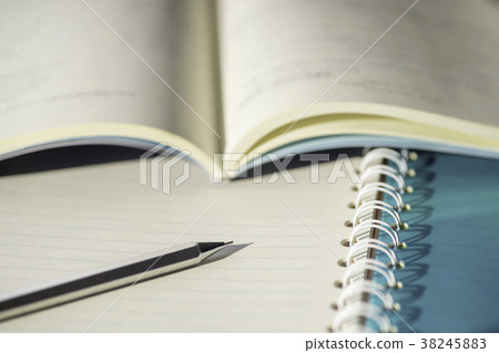Notebook and pen and book Notebook and pen and book 38245883