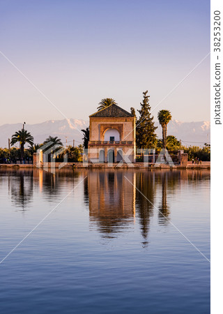 Menara Gardens Pavilion reflect in water at sunset 38253200