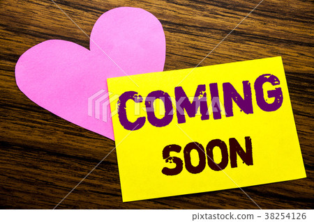 Handwritten text showing Coming Soon Handwritten text showing Coming Soon 38254126