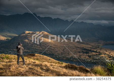 male photographer take photo scenery in Queenstown 38254375