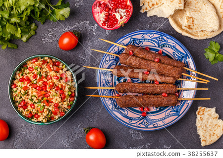 Classic kebabs with tabbouleh salad 38255637