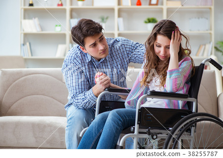 Desperate disabled person on wheelchair 38255787