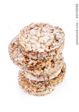 Diet rice cakes pile isolated on white background 38256096