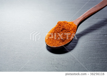 Shichimi pepper in Wooden spoon on black plate, Shichimi pepper in Wooden spoon on black plate, 38256116