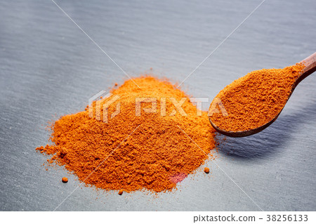 Shichimi pepper in Wooden spoon on black plate, Shichimi pepper in Wooden spoon on black plate, 38256133