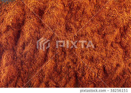 Texture background. Red chilli pepper powder. Top Texture background. Red chilli pepper powder. Top 38256151