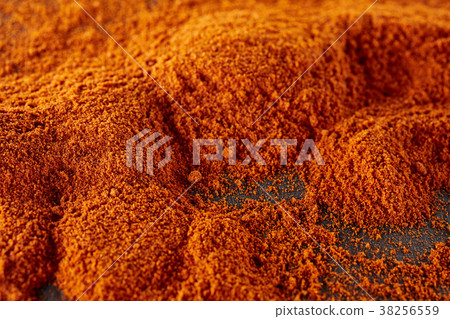 Texture background. Red chilli pepper powder. Top 38256559