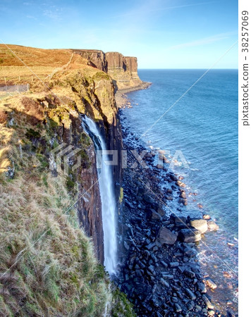 Kilt Rock Waterfall in winter midday. Kilt rocks Kilt Rock Waterfall in winter midday. Kilt rocks 38257069