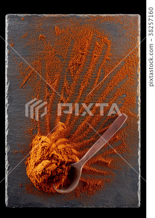 Texture background. Red chilli pepper powder mixed 38257160