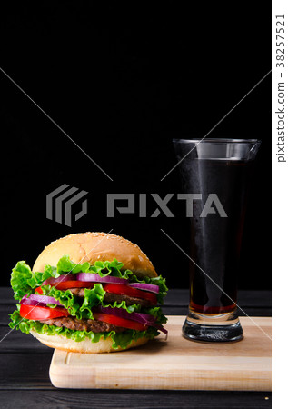 Burger served in bun in nutrition fast food 38257521