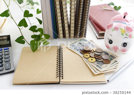 Pig piggy bank and coins 38258144
