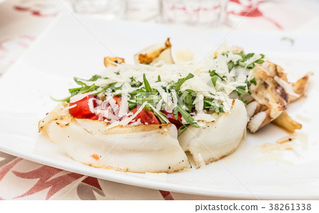 Cuttlefish with tomato, salad and Parmigiano Cuttlefish with tomato, salad and Parmigiano 38261338