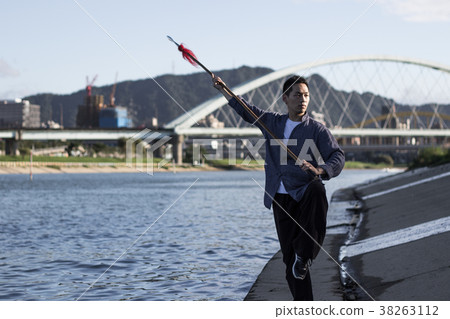 Male martial artist long gun male martial artist Male martial artist long gun male martial artist 38263112