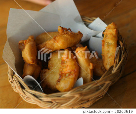 fried crusty bananas dessert served in wicker fried crusty bananas dessert served in wicker 38263619