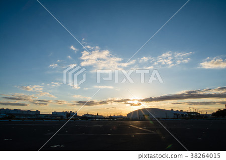 Sunrise over the large concrete-clad square and warehouse Sunrise over the large concrete-clad square and warehouse 38264015
