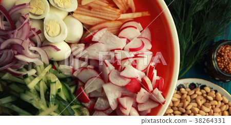 Ingredients for a quail eggs salad. Close up. Ingredients for a quail eggs salad. Close up. 38264331