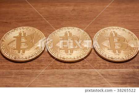 three golden bitcoin coins three golden bitcoin coins 38265522