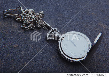 Vintage old clock asphalt background Vintage old clock asphalt background 38266075