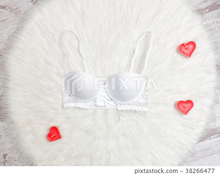 White lace bodice on white fur White lace bodice on white fur 38266477