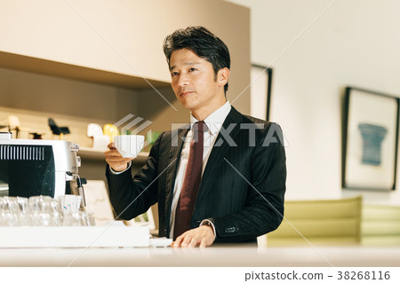 Man drinking coffee Man drinking coffee 38268116