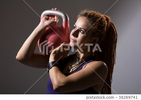 Portrait close up of young attractive female doing Portrait close up of young attractive female doing 38269741