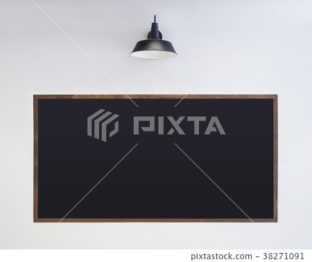 Black Chalkboard on white wall with light  Black Chalkboard on white wall with light  38271091