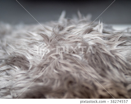 Grey faux fur texture background Grey faux fur texture background 38274557
