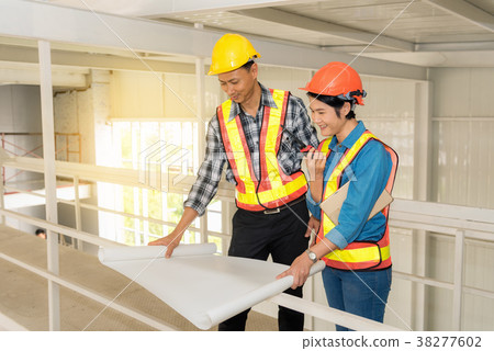 Portrait of engineer and architect discussing Portrait of engineer and architect discussing 38277602