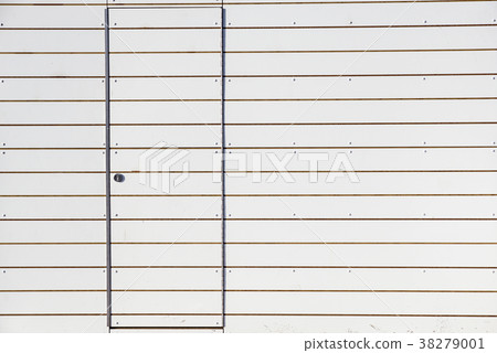 close grey door with aluminium or steel wall 38279001