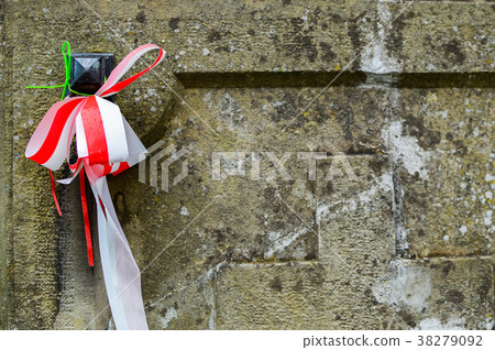 Ribbon with national colours of Poland tied up to Ribbon with national colours of Poland tied up to 38279092