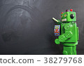 Green robot teacher ot the blackboard 38279768