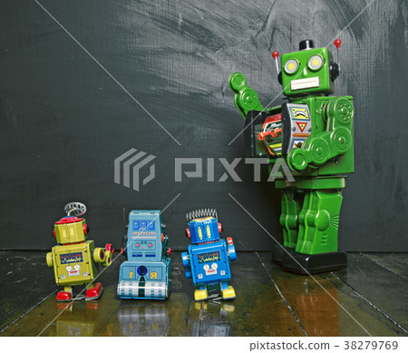 Big green robot toy teaches his class , 38279769