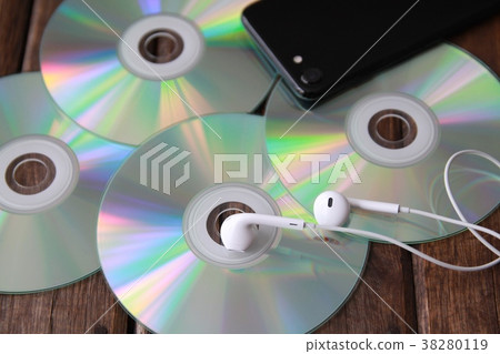 Wired earphones, CD and smartphone music image 38280119