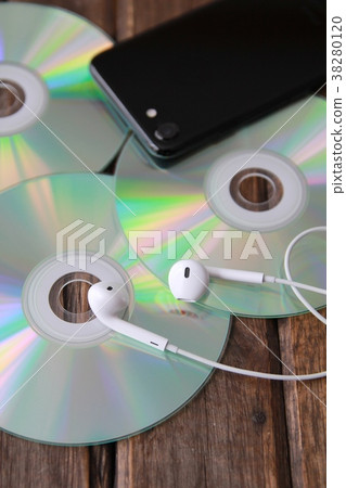 Wired earphones, CD and smartphone music image 38280120