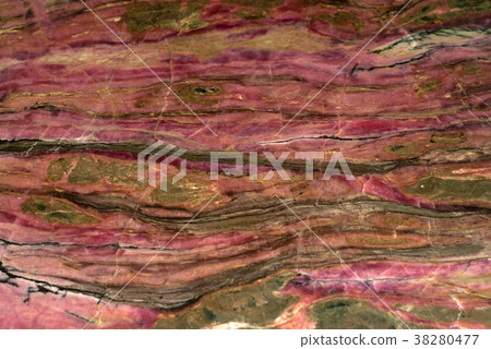 background, texture - surface of a rhodonite block 38280477