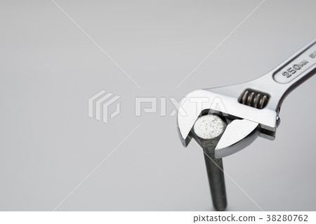 Scene turning a bolt with a monkey wrench Scene turning a bolt with a monkey wrench 38280762