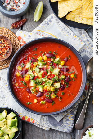 Mexican tomato, bean, bell pepper soup. Top view Mexican tomato, bean, bell pepper soup. Top view 38280998