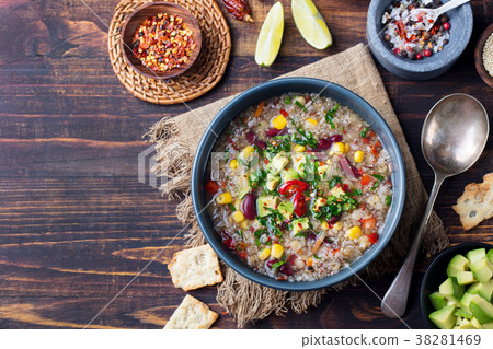 Vegetable quinoa soup stew with avocado corn beans 38281469