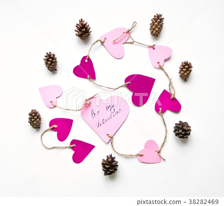 Pink paper hearts for Valentine's day. Flat lay Pink paper hearts for Valentine's day. Flat lay 38282469