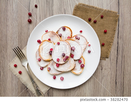 Home made pancakes with cranberries. Flat lay 38282470