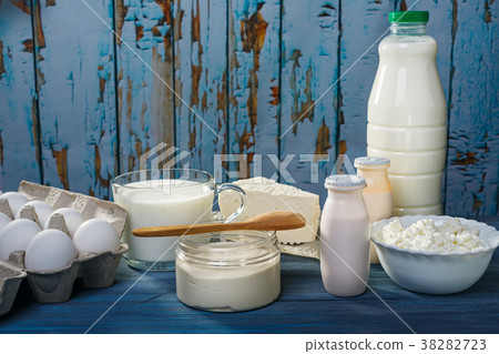 Dairy products on a blue table 38282723