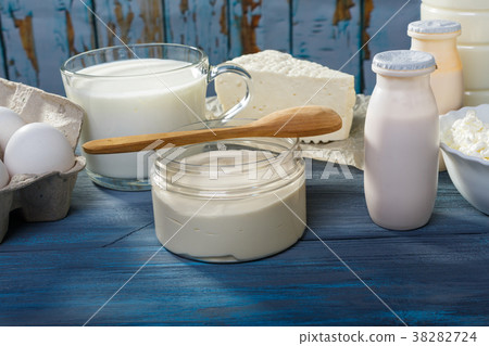 Dairy products on a blue table 38282724