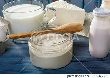 Dairy products on a blue table 38282725