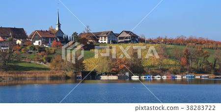 Idyllic village Seegraben in autumn.  38283722