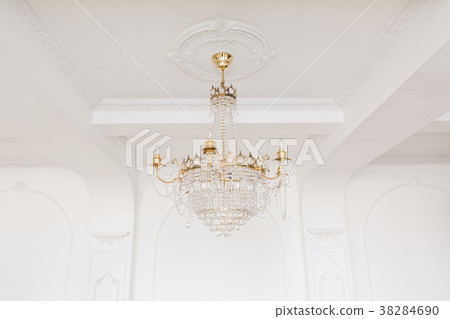 Expensive interior. Large electric chandelier made 38284690